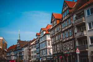 concrete buildings under blue and clear sky